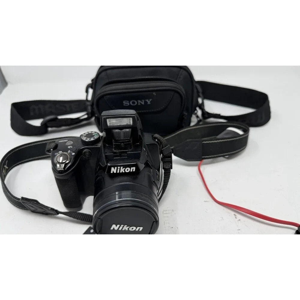 Nikon COOLPIX P500 36X Zoom 12.1MP Tilt Screen Digital Camera - Bundle - Nice